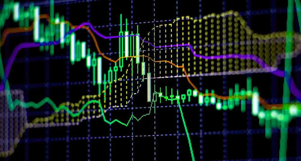 Abstract financial trading graphs on monitor